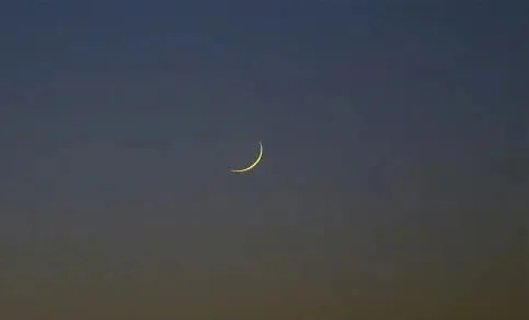 Lunar crescent over Senegalese skies