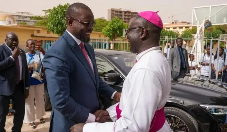 Ousmane Sonko and Monseigneur André Guéye in Popenguine