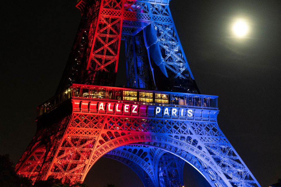 The Eiffel Tower lit up in the colors of Paris Saint-Germain ahead of the Champions League final