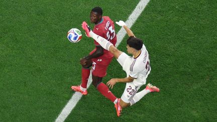 Portuguese defender Nuno Mendes challenging a Spanish player during the World Cup 2026 eighth final match on July 6, 2026 in Dallas, USA
