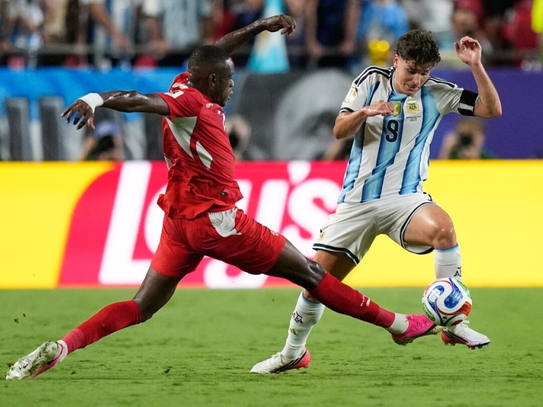 Argentina's Julian Alvarez scores the decisive goal against Switzerland