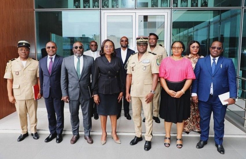 Gabonese customs and tax officials collaborating in modern office