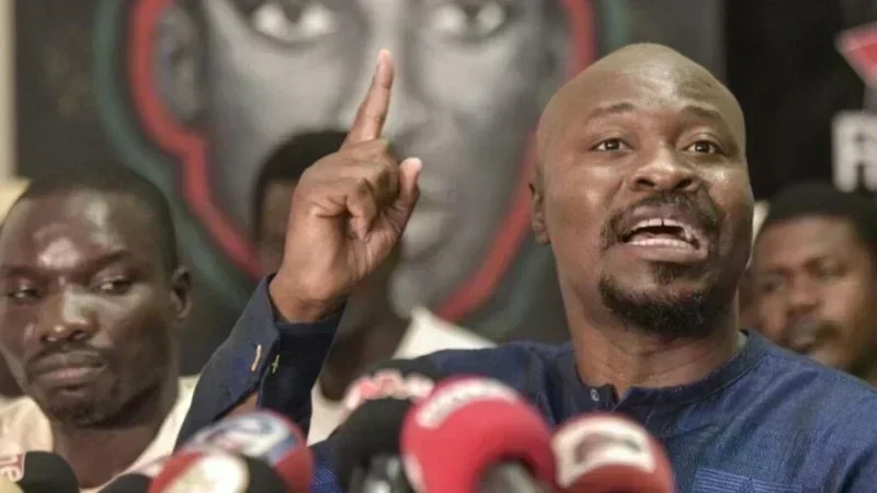 Senegalese politician Guy Marius Sagna discussing political funds