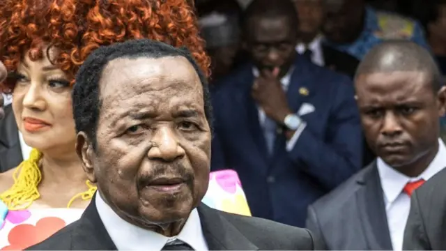 Paul Biya during one of his last public appearances in Cameroon during Pope Léon XIV's visit in April 2026, surrounded by Cameroonian officials and his wife, First Lady Chantal Biya.