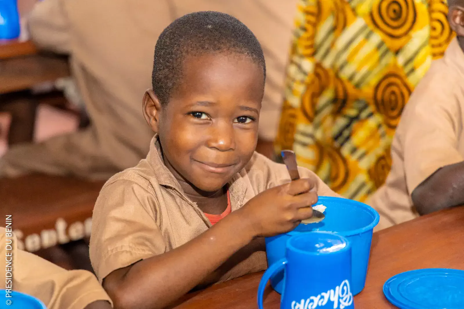 Students in a Beninese classroom engaged in learning