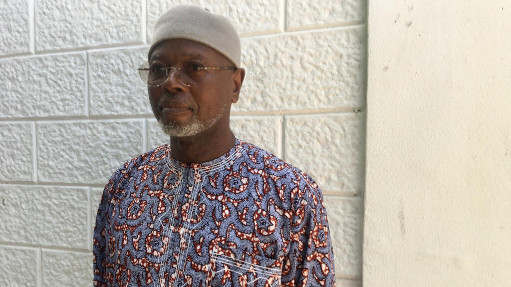 Senegalese human rights advocate Alioune Tine, founder of Afrikajom Center, speaking at a press conference in Dakar.
